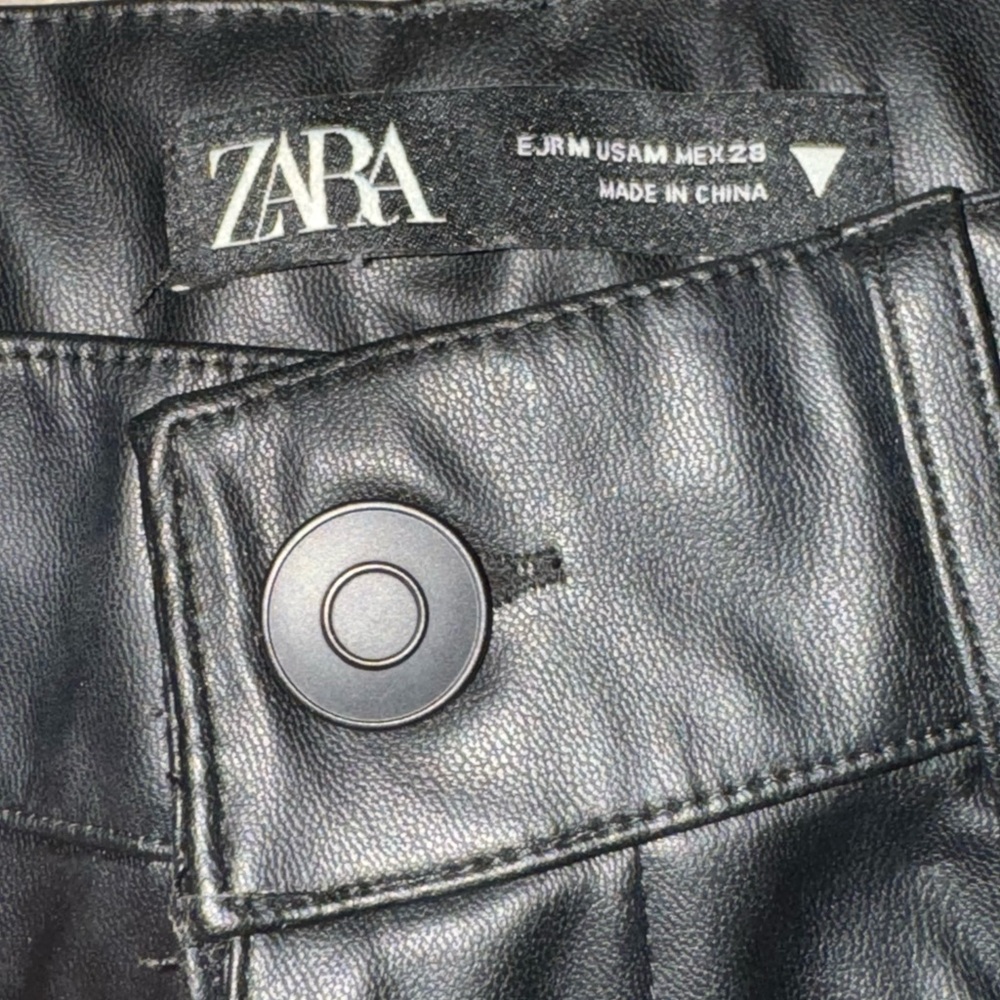 Black faux, leather Zara pants with seam running down the front